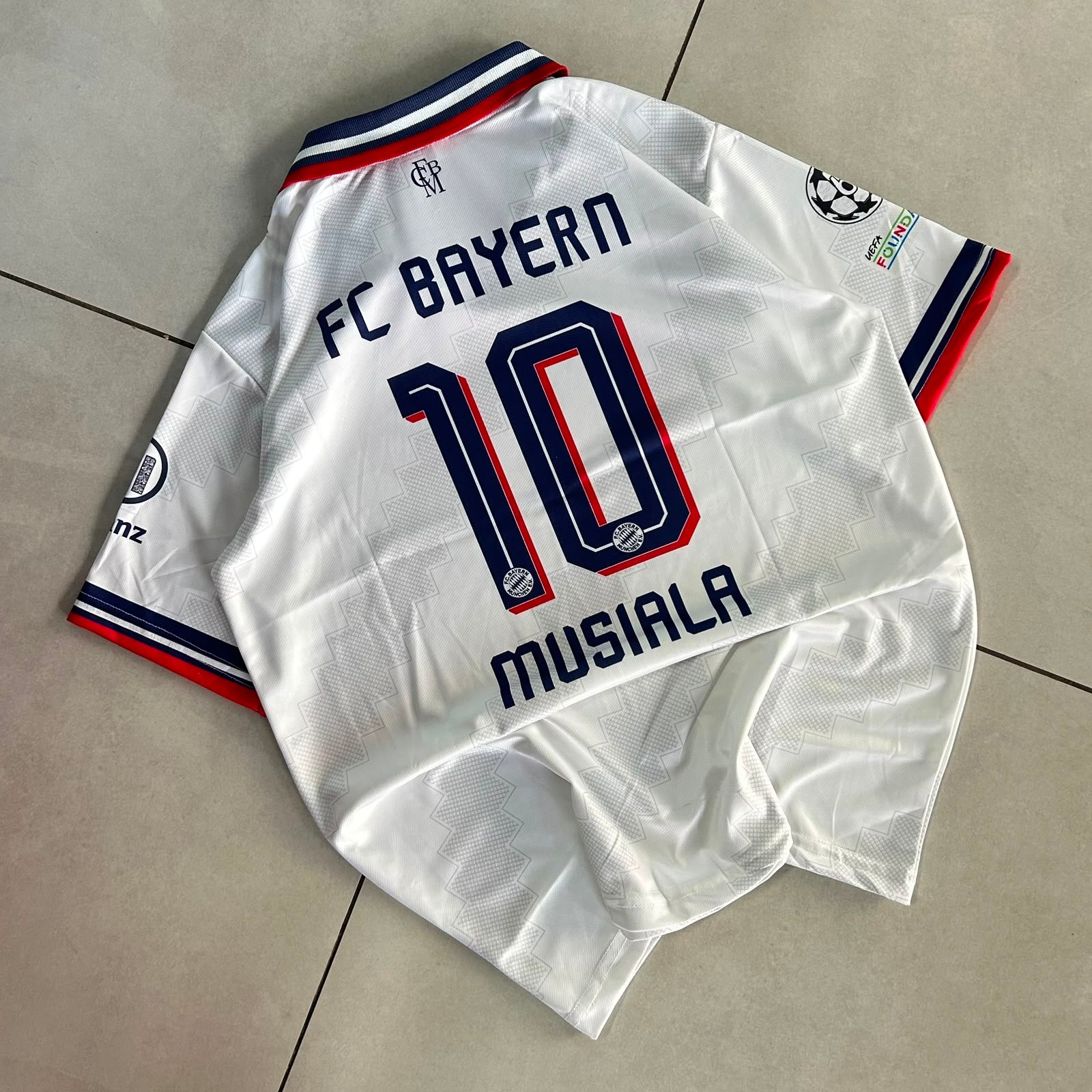 BAYERN MUNICH 2026 - 2027 COLLAR AWAY JERSEY PREMIUM MUSIALA